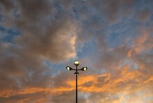 Low Angle View Of Street Light Against Sky During Sunset