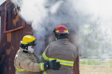 Wall Mural - volunteer firefighters at fire drill