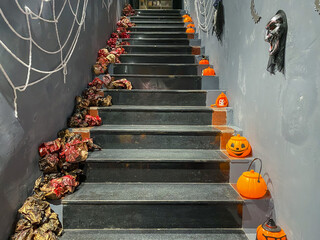 Creepy halloween decoration concept on indoor stairway 