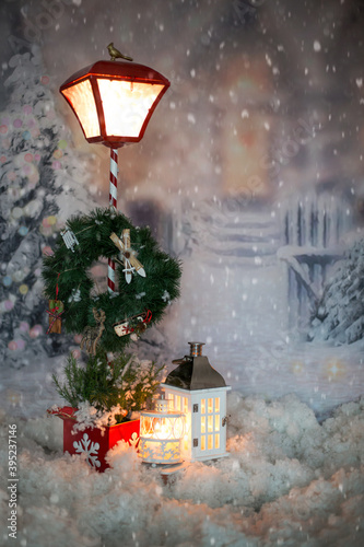 Christmas decoration in front of a house, light and lanterns with candles, outdoor shot