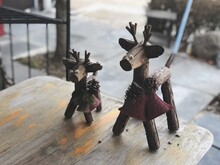 Close-up Of Wooden Figurines On Table