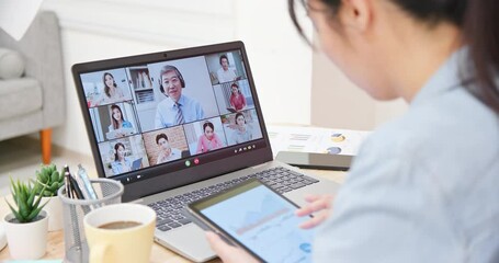 Canvas Print - Female worker has video meeting