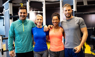 Sticker - Group of sportive people in gym. Happy fit friends workout, exercise in fitness club