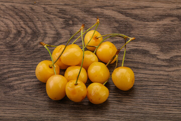 Sweet ripe yellow cherry heap