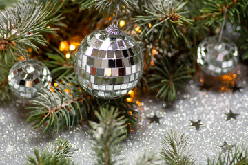 Shiny Christmas ornaments with festive background