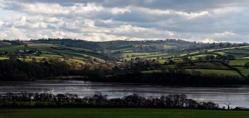 Wall Mural - Evening light, looking over the Teign Estuary to farmland, Devon, England, UK.