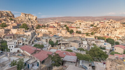 Wall Mural - Urgup Town aerial view from Temenni Hill in Cappadocia Region of Turkey timelapse