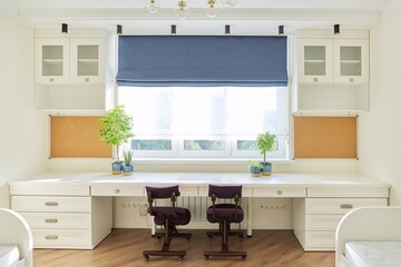 Interior of children's room for two children in light colors