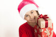 © kaganskaya115 - Happy smiling child girl Santa with Christmas boxes on white background