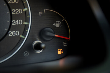 Empty fuel warning light in car dashboard. Fuel pump icon. gasoline gauge dash board in car with digital warning sign of run out of fuel turn on. Low level of fuel show on speedometer dashboard.