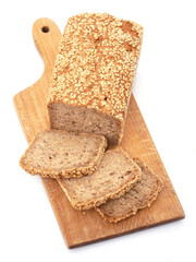 Healthy bread made of spelled flour and sesame seeds. Isolated on white background. 