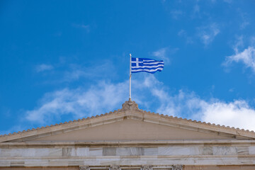 Sticker - Greek flag waving against blue sky background.