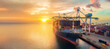 Leinwandbild Motiv crane loading cargo container to container ship stand by in the international terminal logistic container depot sea port  concept smart freight shipping by ship at sunset , webinar banner
