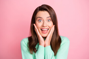 Poster - Photo portrait of cheerful surprised girl touching cheekbones laughing isolated on pastel pink color background