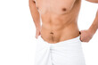 © LIGHTFIELD STUDIOS - cropped view of shirtless man in towel posing isolated on white