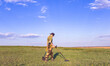 © Evgeniy Kozlov - Man with a metal detector and a shovel looking for treasure