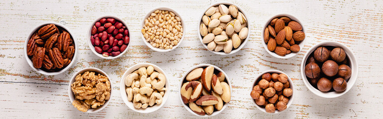 Wall Mural - Various Nuts in bowls.