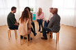 © Monkey Business - People Attending Support Group Meeting For Mental Health Or Dependency Issues In Community Space