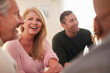 © Monkey Business - People Attending Support Group Meeting For Mental Health Or Dependency Issues In Community Space