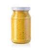 Glass jar of mustard isolated