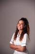 © Monkey Business - Studio Portrait Of Young Female Nurse Wearing Uniform Standing Against Grey Background