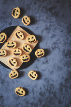 Halloween Pumpkin Shaped Jack O'Lantern Sandwich Cookies.