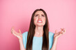 © deagreez - Crazy lady bad mood grinning teeth look up empty space wear t-shirt isolated pink pastel color background