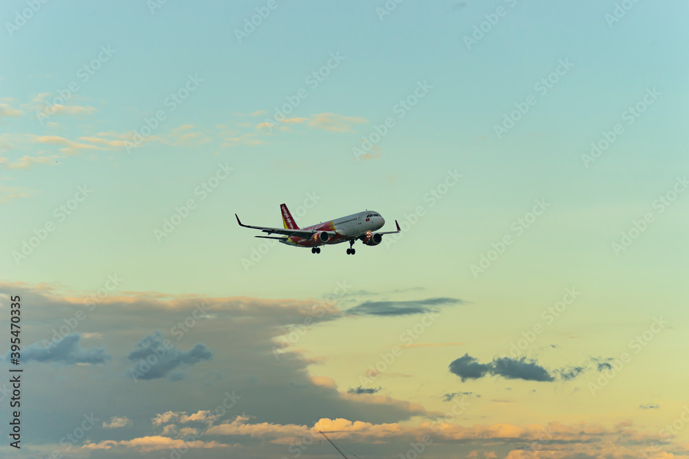 Vietjet Air airbus a321 fly over urban areas preparing landing into Tan ...