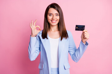 Sticker - Photo of young beautiful positive good mood bossgirl show okay sign hold credit card isolated on pink color background