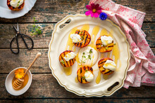 Grilled Peaches With Honey, Sour Cream And Thyme