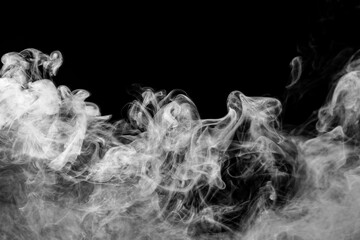 gray smoke with a blue tint on a black background