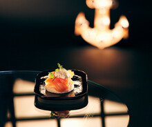 A Salmon Canap� On A Serving Platter On A Dark Surface