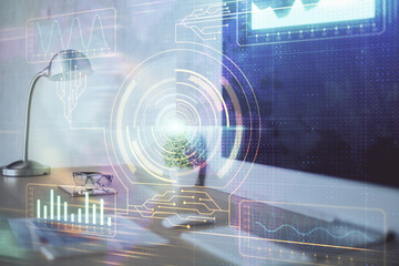 double exposure of desktop computer and technology theme hologram. concept of software development.