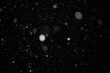 © Alex - Abstract Background Defocus Light Spots on a black background.
