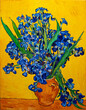 Oil painting on canvas. Vase with irises on a yellow background. Free copy based the famous painting by Vincent Van Gogh