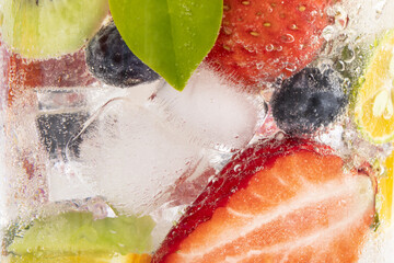 Poster - Closeup shot of fruit slices in a mineral water