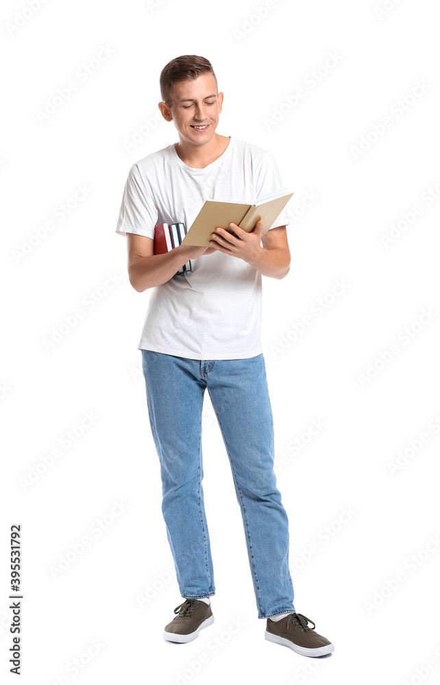 Young man with books on white background