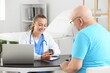 © Pixel-Shot - Senior diabetic man visiting doctor in clinic
