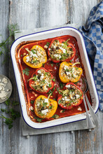 Peppers Stuffed With Rice, Feta, Mushrooms, Dill And Parsley In Tomato Sauce With Feta Cheese