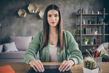 Sticker - Portrait of optimistic girl doing homework from home wear green shirt indoors