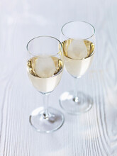 White Wine On White Wooden Surface