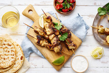 Marinated Chicken Skewers With Coriander, Lemon And Tomato Salad