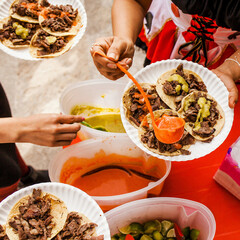 Wall Mural - Mexican people eating Tacos al Pastor in Mexico city street food