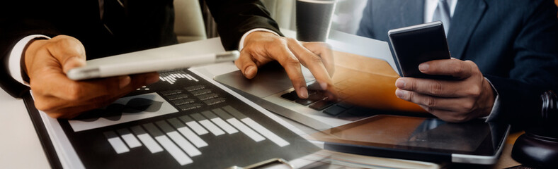 businesswoman hand using smart phone, tablet payments and holding credit card online shopping, omni channel, digital tablet docking keyboard computer at office in sun light