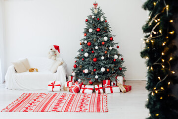 Wall Mural - Beautiful decorated room with Christmas tree with presents under it