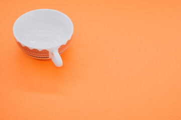 Sticker - Top view of a cup isolated on an orange background