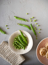 An Arrangement Of Peas And Pea Pods