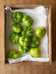 Wall Mural - Green Tomatoes In Wooden Box