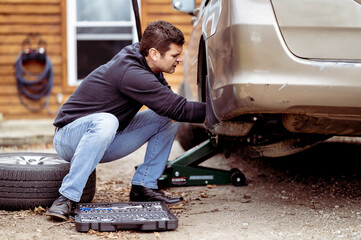 Sticker - Closeup shot of a technician repairing a car