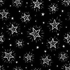 Wall Mural - image of white festive stars on black background